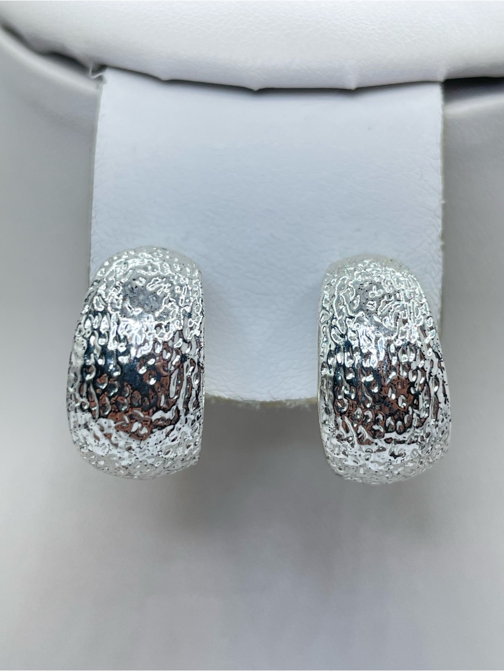 Vintage Monet Silver Tone Clip On Huggie Hoop Earrings Textured